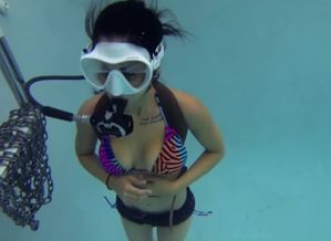 scuba in pool with flooded mask